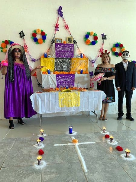 Day of the Dead altar and participants